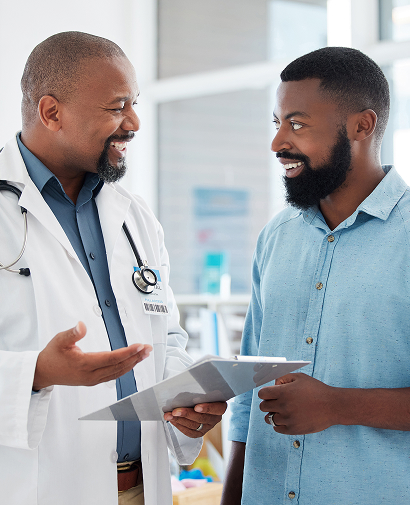 A Genesis provider talking with a patient